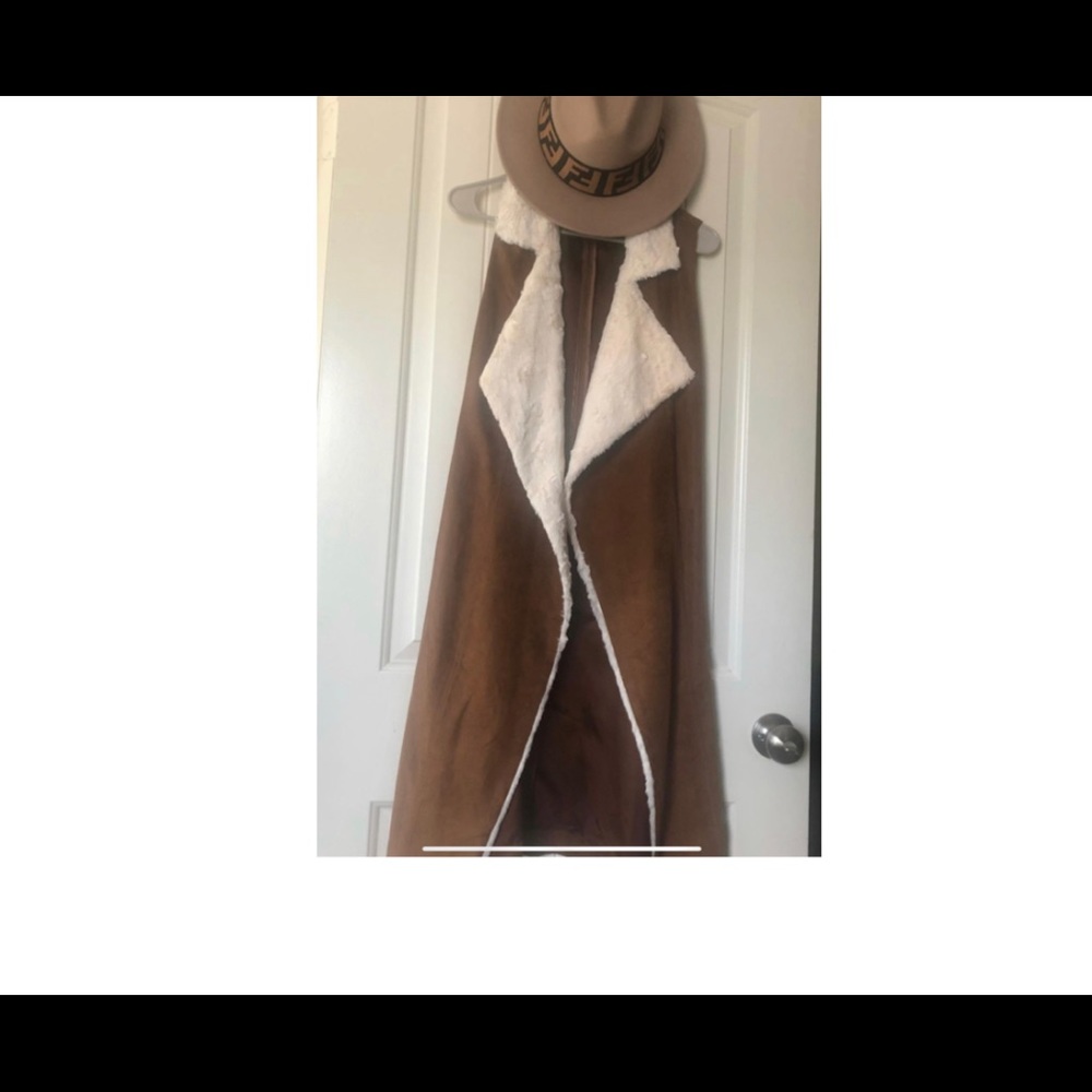 Knee length vest